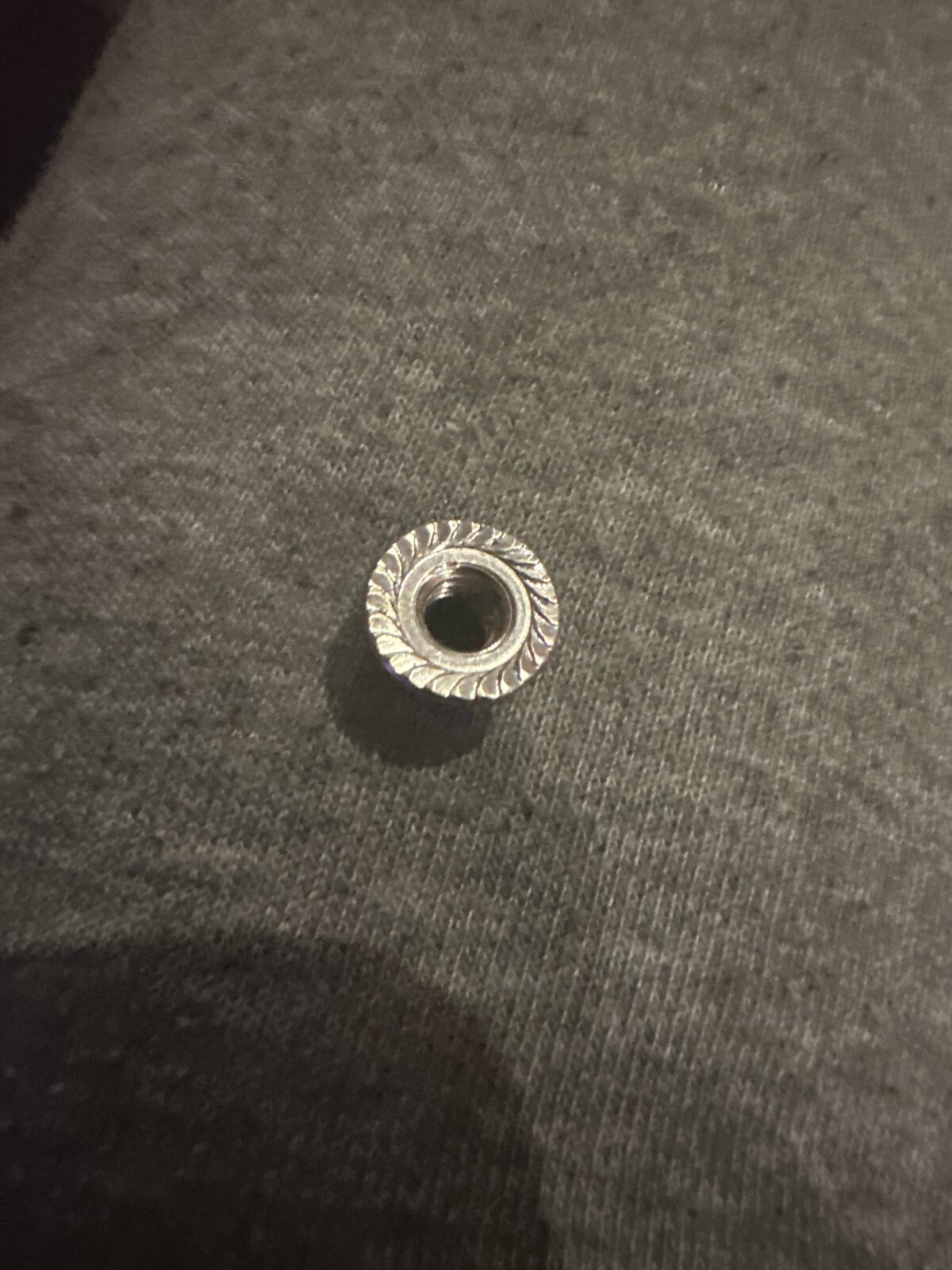 my spur gear keeps getting loose the bolt i keep tigting it completly ...