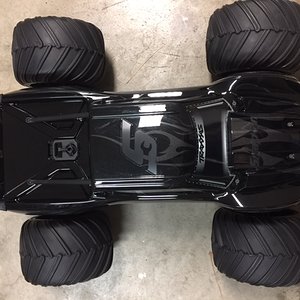 X-maxx With Losi 1/5 scale monster claw tires.