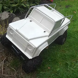 Outside with land rover body and custom rollcage