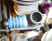 Installed throttle return spring